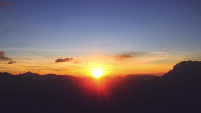 Mountains sunset sky light 4k wallpaper