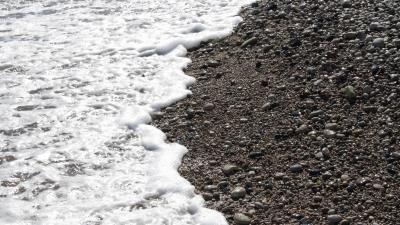 Pebble stones sea waves whisper foam 4k wallpaper