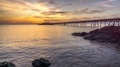 Pier stones sea 4k wallpaper