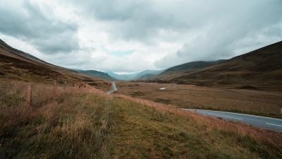 Road hills grass 4k wallpaper