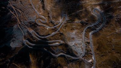 Road serpentine aerial view 4k wallpaper