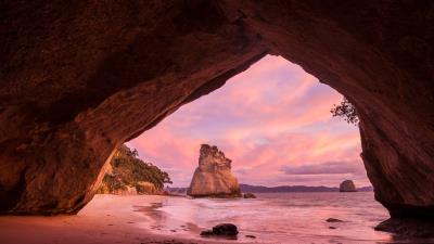 Rock cave beach 4k wallpaper