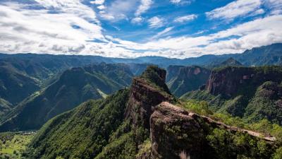 Rocks cliff distance 4k wallpaper