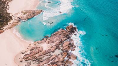 Rocks foam splash 4k wallpaper