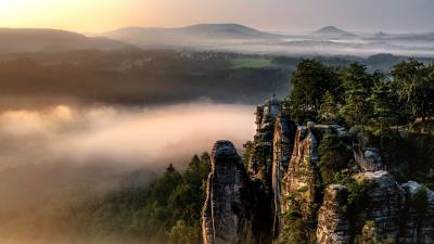 Rocks fog hills 4k wallpaper