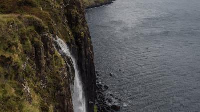 Rock waterfall grass 4k wallpaper