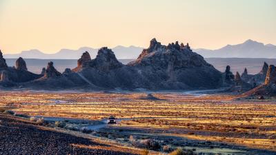 Rocks road car 4k wallpaper