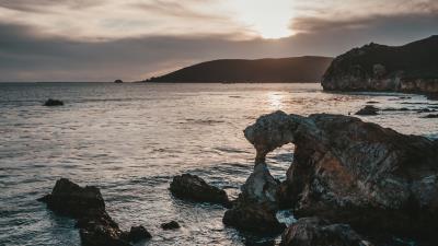 Rocks sea sunset 4k wallpaper