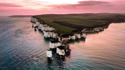 Rocks sunset sea 4k wallpaper