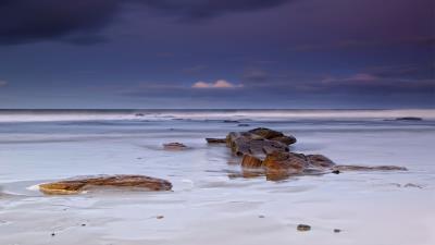 Sea beach coast sand white stone 4k wallpaper