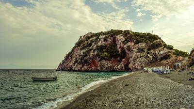 Sea rock boat shore 4k wallpaper