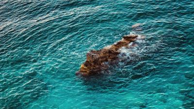 Sea rocks aerial view 4k wallpaper