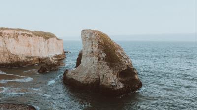 Sea rocks cliff image 4k wallpaper