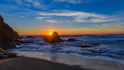 Sea shore rocks surf sunset 4k wallpaper