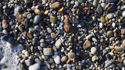 Sea stones shore wet 4k wallpaper