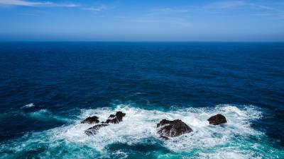 Sea surf rocks horizon 4k wallpaper