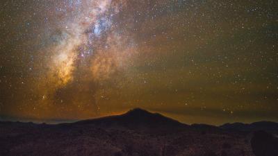 Starry sky mountains milky way 4k wallpaper