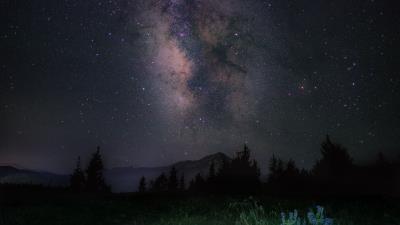 Starry sky night mountains grass milky way 4k wallpaper