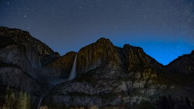 Starry sky precipice waterfall 4k wallpaper