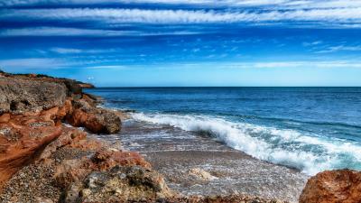 Stones rocks coast 4k wallpaper