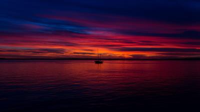 Sunset boat ocean 4k wallpaper