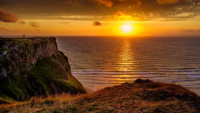 Sunset horizon rock 4k wallpaper