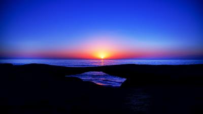 Sunset horizon sea sky sun 4k wallpaper