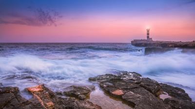 Sunset lighthouse sea 4k wallpaper