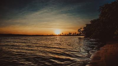 Sunset shore ripples 4k wallpaper