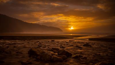 Sunset stone water 4k wallpaper