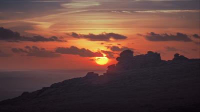 Sunset sun rocks image 4k wallpaper