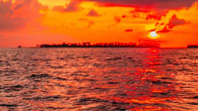 Sunset water waves 4k wallpaper