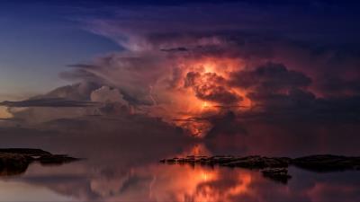 Thunderstorm clouds ocean 4k wallpaper