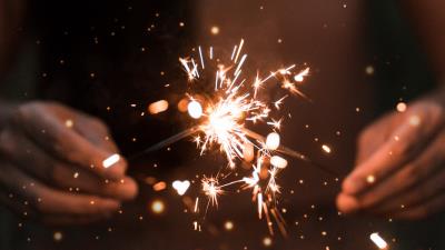 Sparkler spark hands 4k wallpaper