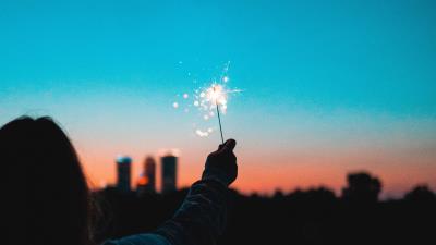 Sparklers sparks hand image 4k wallpaper