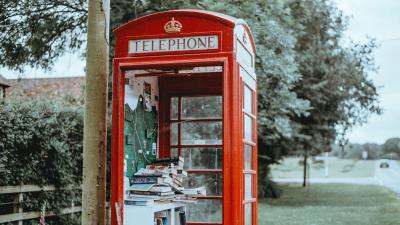 Telephone booth books street 4k wallpaper