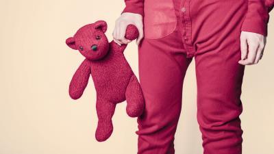 Toy bear child hand 4k wallpaper