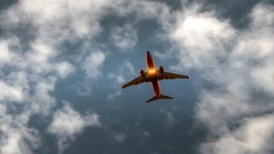 Airplane sky clouds flight 4k wallpaper