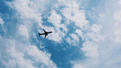 Airplane sky flight clouds 4k wallpaper