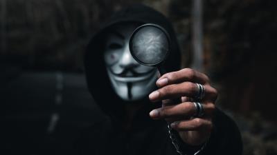 Anonymous hand magnifier 4k wallpaper