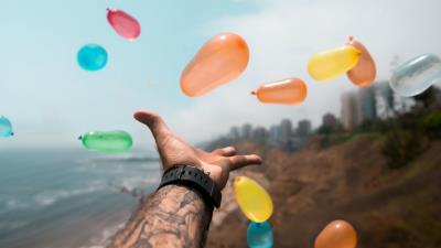 Balloons hand multicolored 4k wallpaper