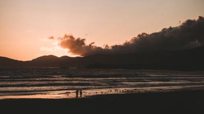 Beach walk sunset 4k wallpaper