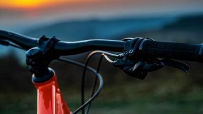 Bicycle steering wheel evening 4k wallpaper
