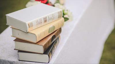 Books flowers blur 4k wallpaper