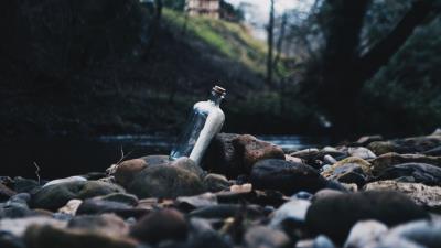 Bottle message shore 4k wallpaper