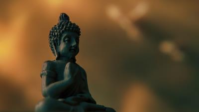 Buddha figurine deity 4k wallpaper