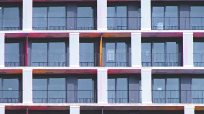 Building facade balconies 4k wallpaper