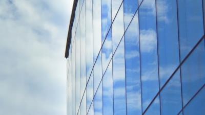 Building facade clouds 4k wallpaper