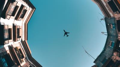 Building sky plane image 4k wallpaper