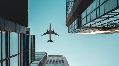 Buildings airplane skyscrapers 4k wallpaper